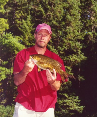 Dan with a smallmouth bass - image