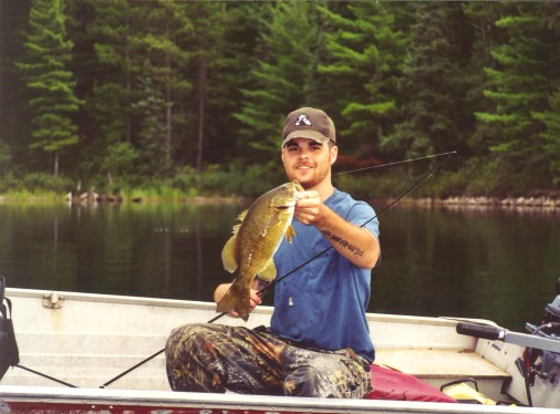 Luke with a smallmouth 1 - image